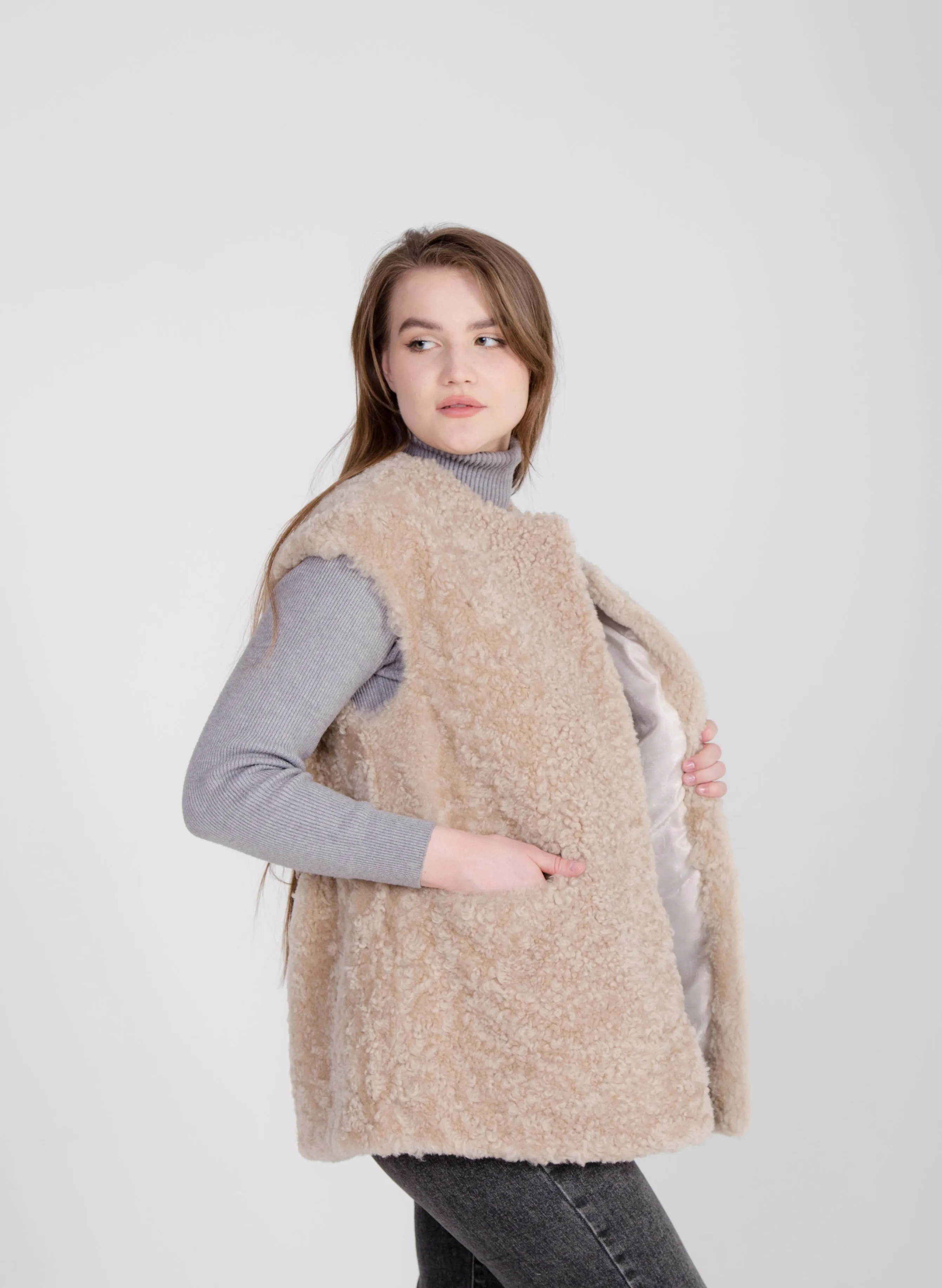 Long Beige Womens Shearling Vest with Boucle Sheepskin and Two Colored Leather Belt