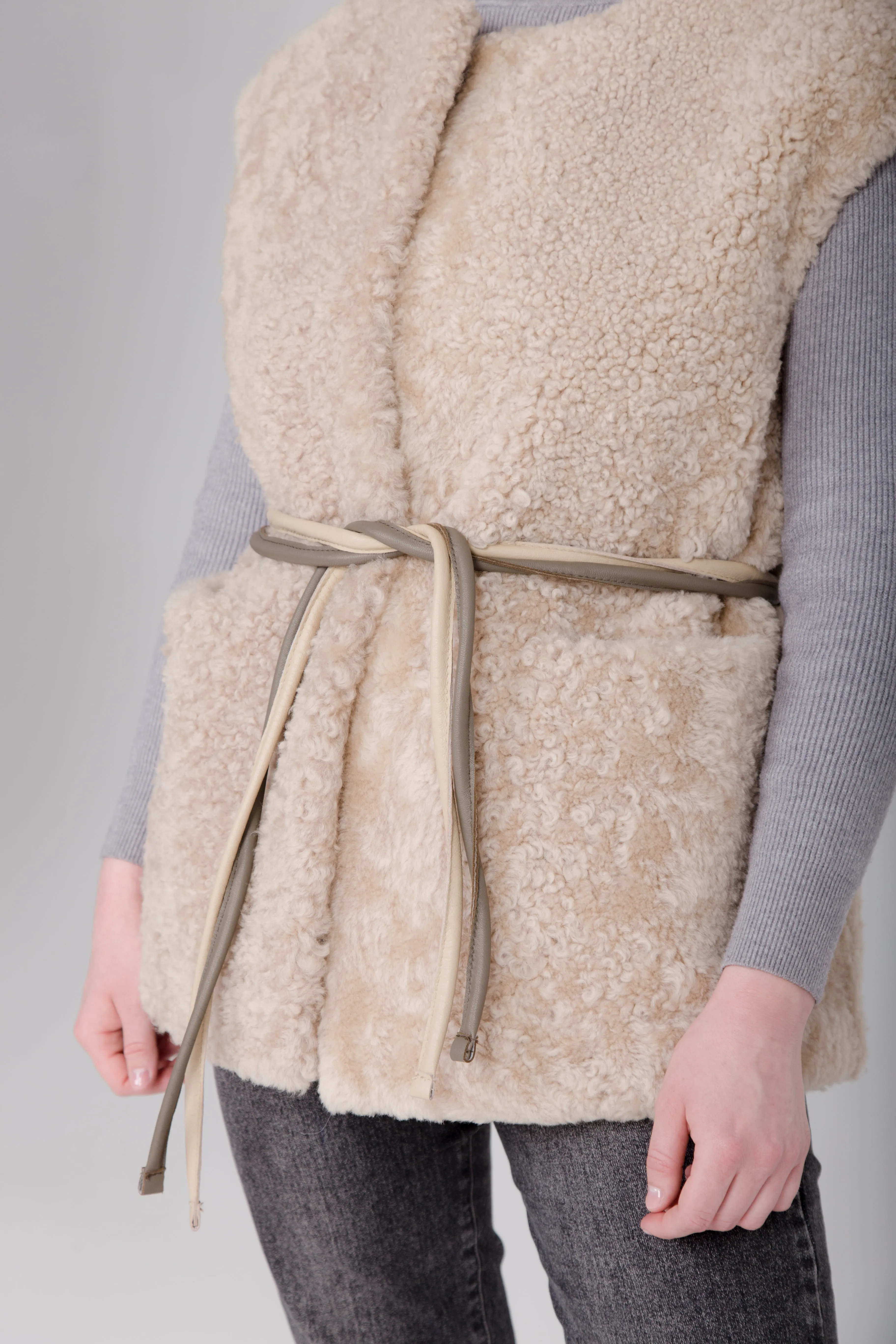 Long Beige Womens Shearling Vest with Boucle Sheepskin and Two Colored Leather Belt